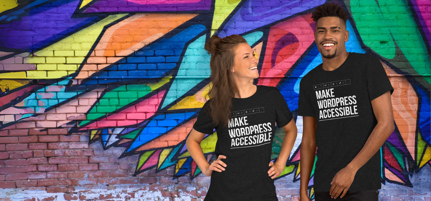 A young white woman and black man wearing Make WordPress Accessible t-shirts and standing in front of a colorful mural.