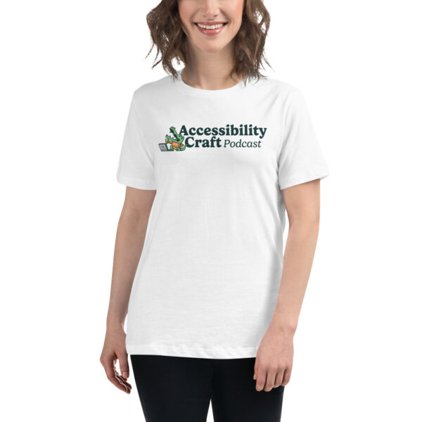 Woman wearing a white Accessibility Craft Podcast t-shirt.